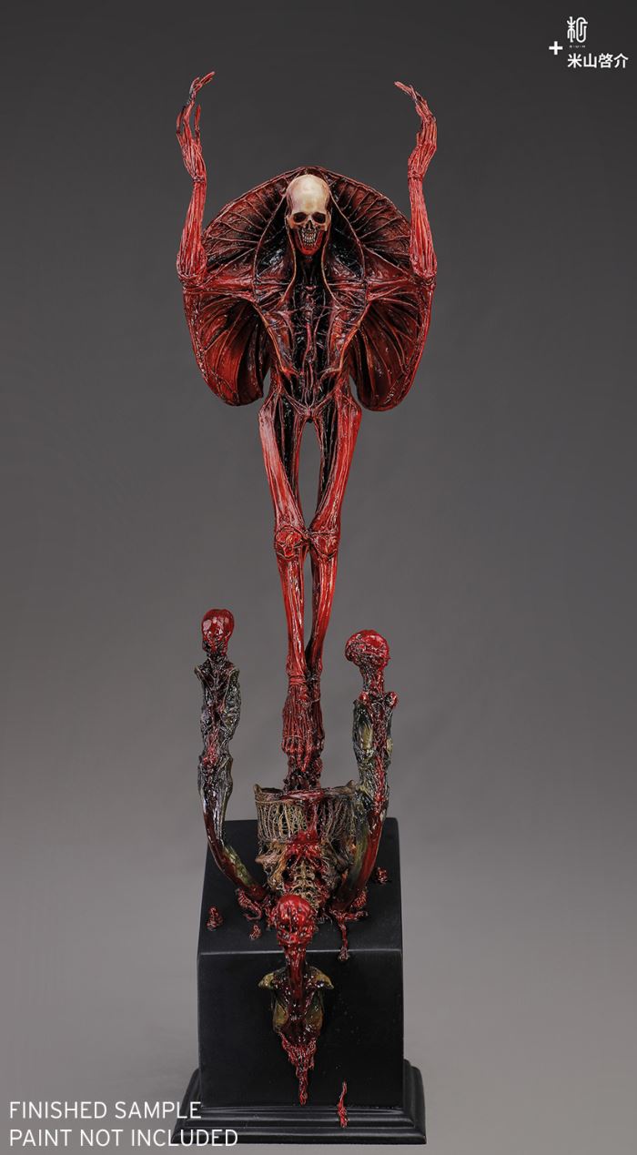 RED STATUE AND CANNON