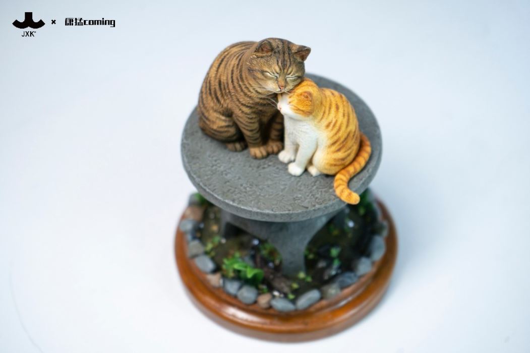 Cats Resting Among Stones