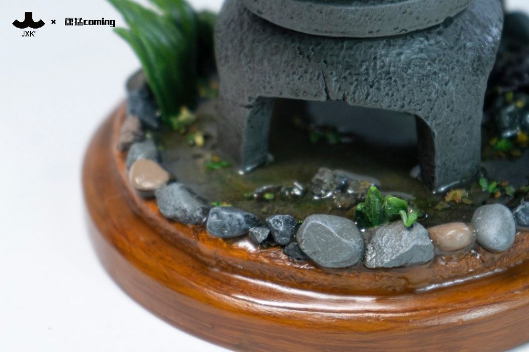 Cats Resting Among Stones